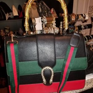 Beautiful black bag with bamboo like handle